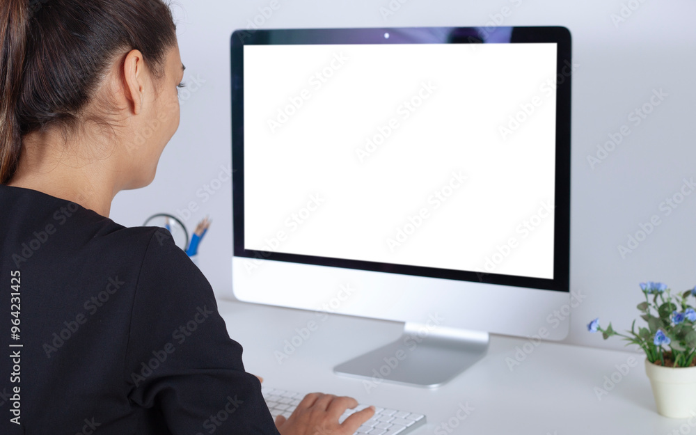 woman using computer at office