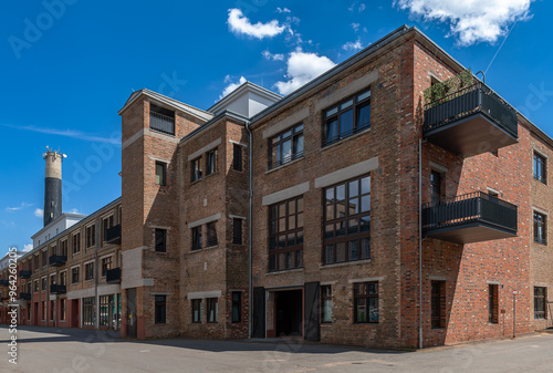 Restoration and conversion of an old factory site into a residential complex