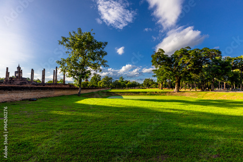 Background atmosphere inside the important historical tourist attraction Sukhothai Historical Park,foreign tourists from all over the world like to bring their children study history during holiday.