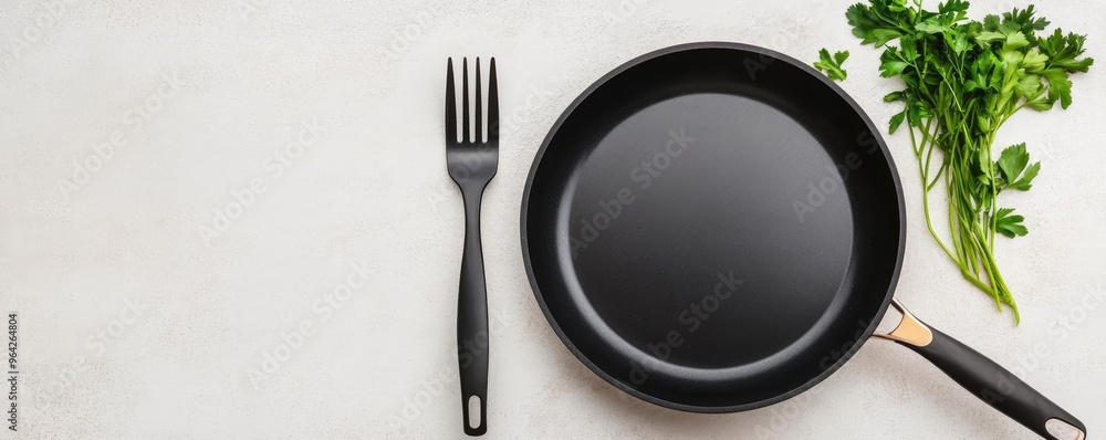 Non-stick frying pan with sleek spatula and fork, modern kitchen, minimalist design, clean lines, high contrast, professional cooking tools Non-stick frying pan with sleek spatula and fork, modern kitchen, minimalist design, clean lines, high contrast, professional cooking tools