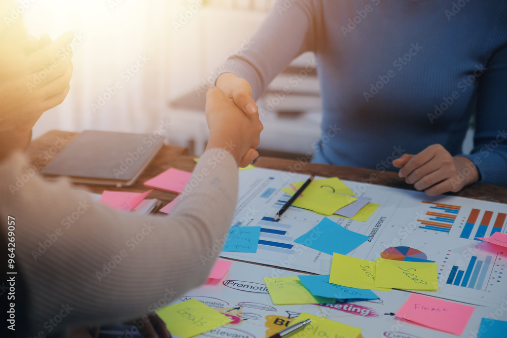 Business people shaking hands, finishing up a meeting. Two confident business man shaking hands during a meeting in the office, success, dealing, greeting and partner concept. Business people shaking hands, finishing up a meeting. Two confident business man shaking hands during a meeting in the office, success, dealing, greeting and partner concept.