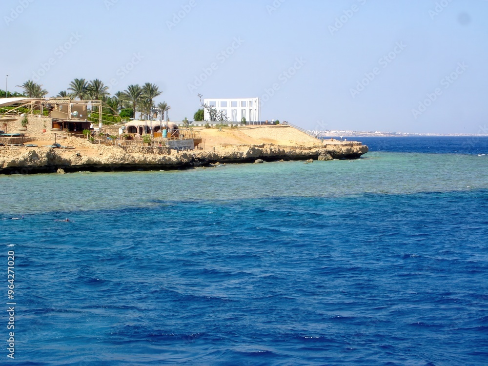 Boat Trip Along the Coast Near Sharm El Sheikh to a Coral Island in the Red Sea Boat Trip Along the Coast Near Sharm El Sheikh to a Coral Island in the Red Sea