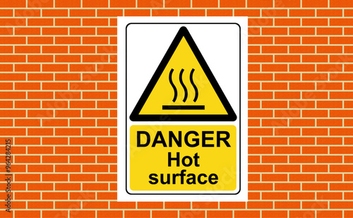 Danger hot surface sign on a wall on a wall