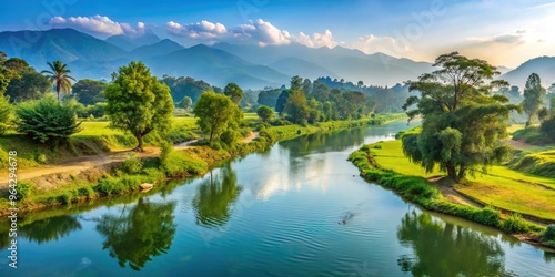 Tranquil View Of The Sacred Bagmati River, Its Calm Waters Flowing Through A Lush Landscape Of Trees And Green Fields