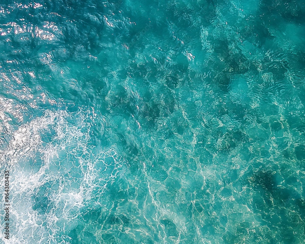 Fototapeta premium Aerial View of Clear Sea Water with Rippling Wave Patterns