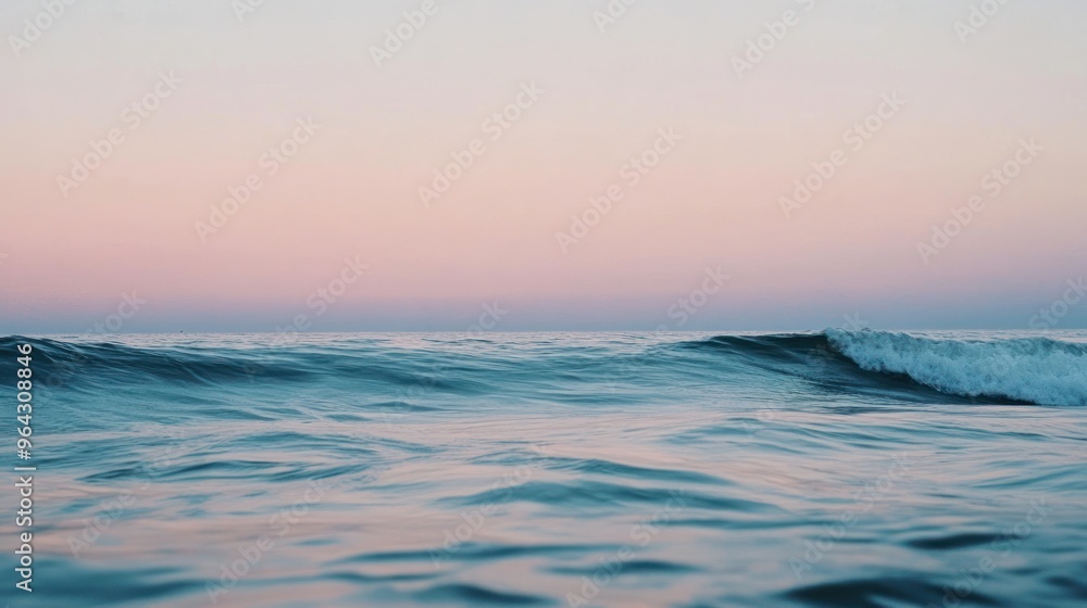 Obraz premium Tranquil Ocean Wave at Sunset