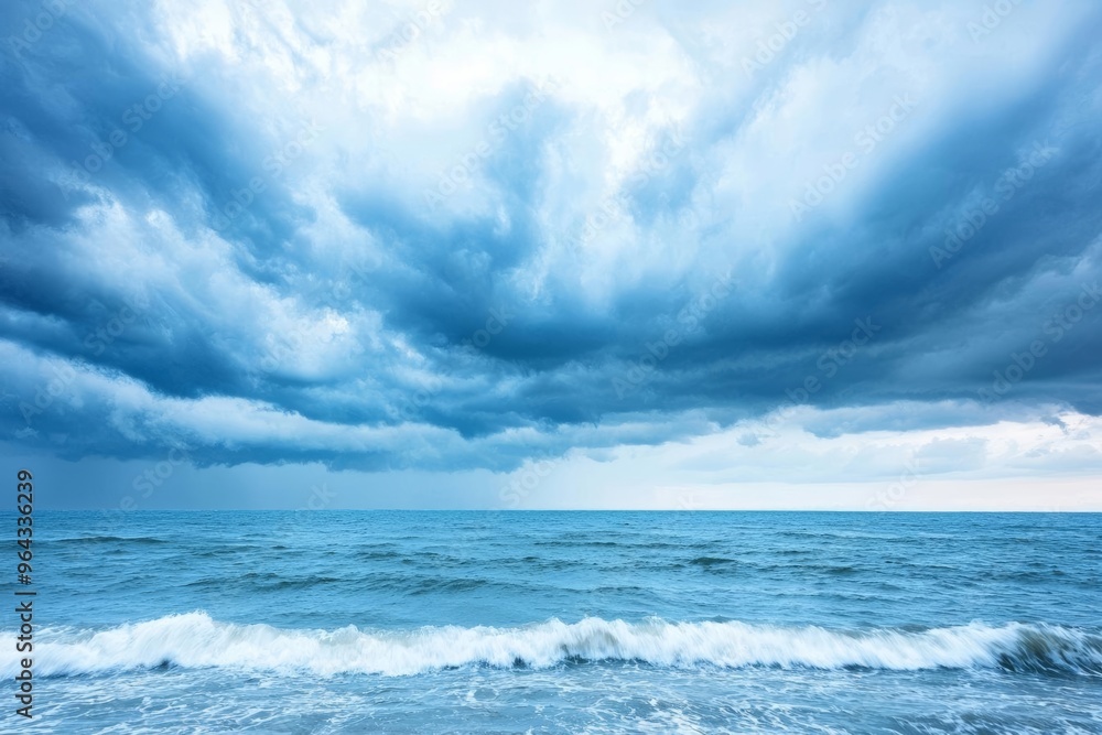 Fototapeta premium Dramatic storm clouds gathering over the ocean, intense weather, approaching storm