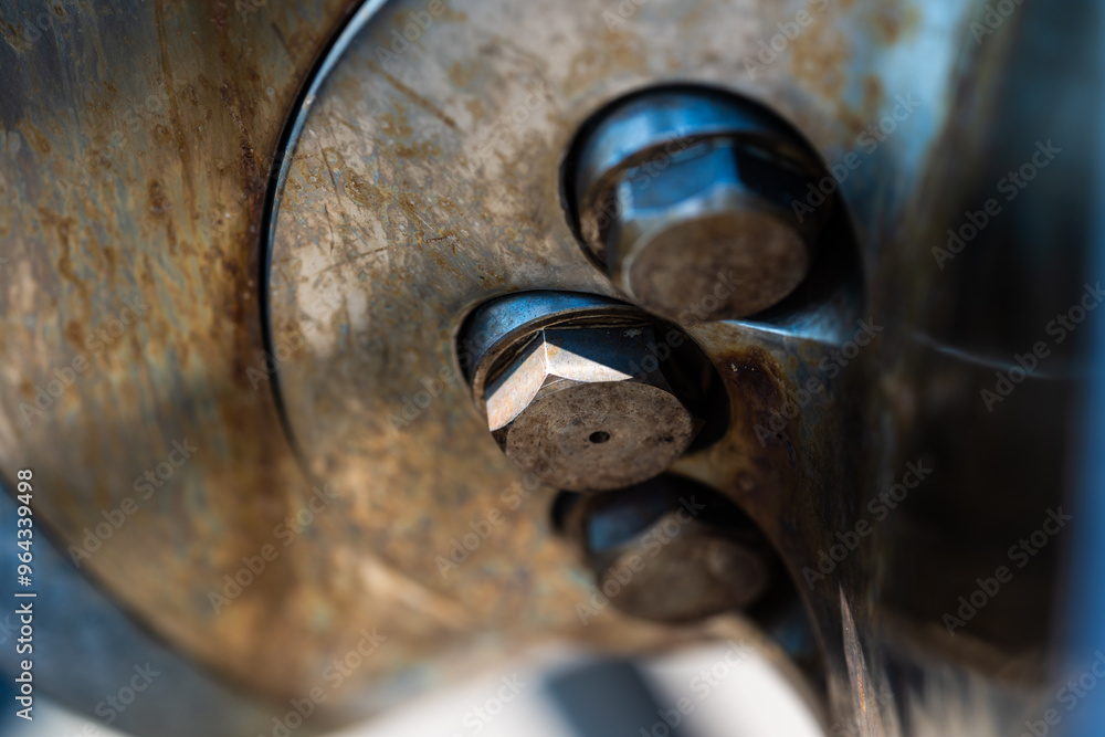 Bolts securing the blades of a large ship propeller. Bolts securing the blades of a large ship propeller.
