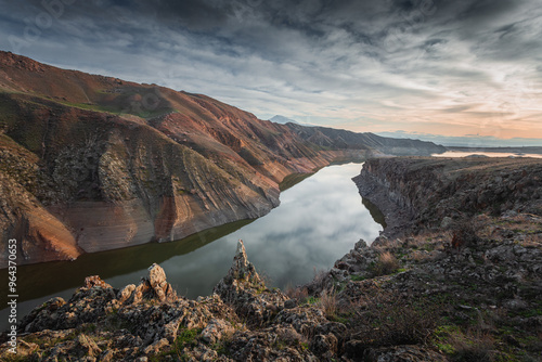 reservoirs in the dry mountains of Armenia at sunset photo