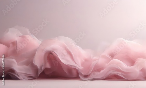 Soft, flowing pink fabric creates a dreamy, ethereal effect against a light pink background.