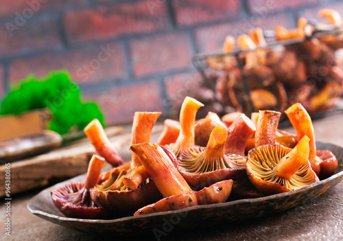 edible mushroom in metal bowl photo