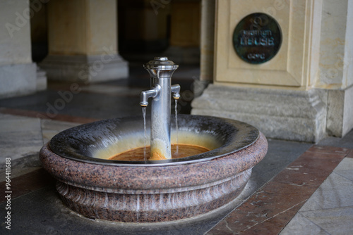 Libuse Pramen Hot Spring with Mineral Water in the Mill Colonnade or Mlynska Kolonada in Karlovy Vary, Carlsbad, Czech Republic