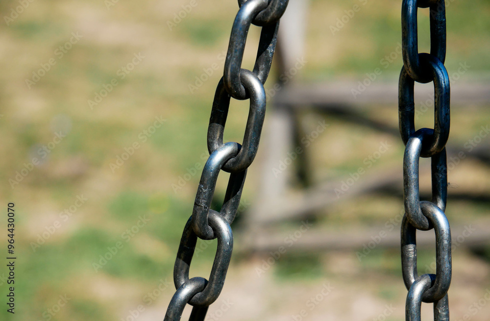 Smoked chain links close up shot on a sunny bright day. Smoked chain links close up shot on a sunny bright day.