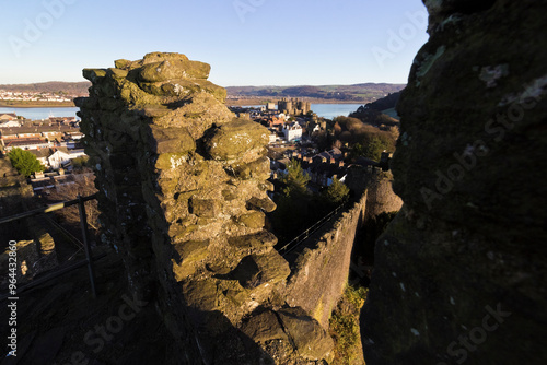 View of the World Heritage Site Conwy Castle from the remains of the town walls, Conwy, North Wales photo