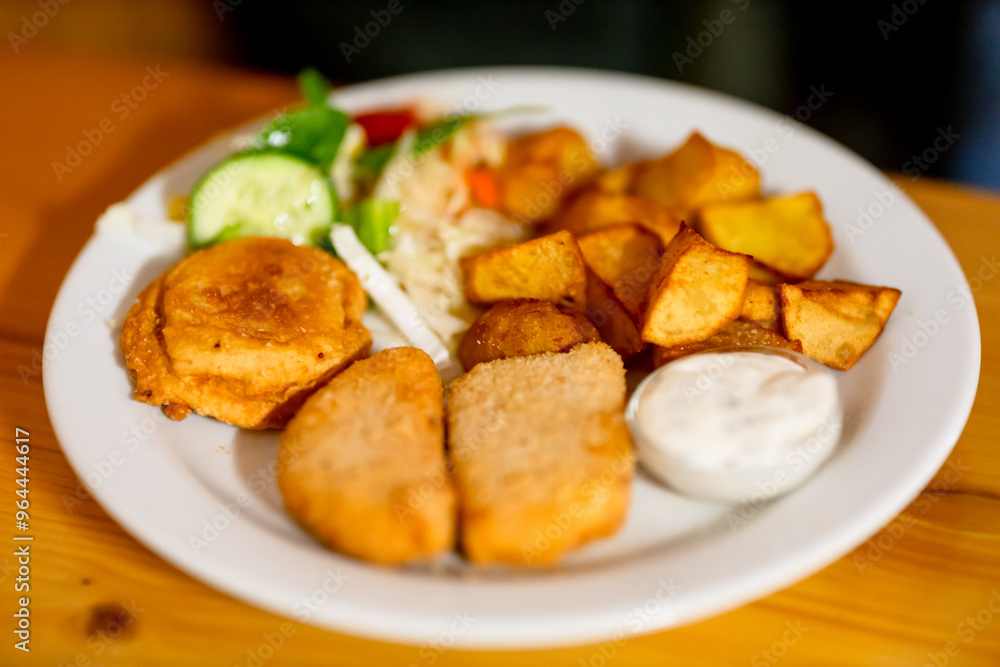 Czech dish of toasted cheese with tartar sauce and toppings. Czech dish of toasted cheese with tartar sauce and toppings.