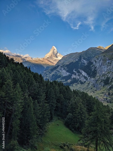 Matterhron at sunrise with the first rays of sun on the summit. Most beautiful mountain in Switzerland. Wanderlust in the Swiss mountains. Zermatt Valais. High quality photo