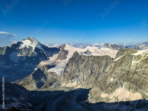 Alpine tour to the summit of Point de Zinal with a magnificent view of the glaciers and the Matterhorn and Dent d'Hérens. Mountaineering in the Valais Alps above Zermatt and Zinal Switzerland