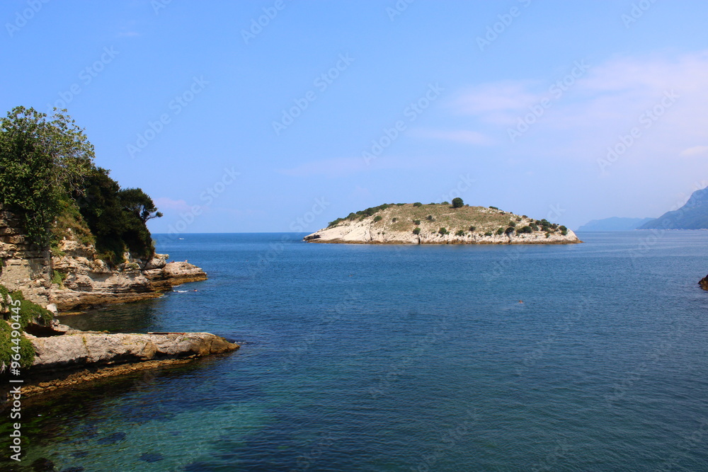 Fototapeta premium An island in the middle of the sea and the rocks next to it. Amasra, Bartin, Turkey