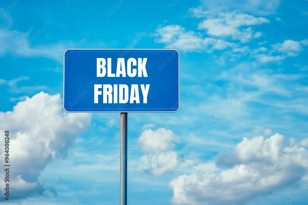 Black friday message written on blue metal sign with cloudy sky background. Conceptual black friday symbol. Copy space. Black friday message written on blue metal sign with cloudy sky background. Conceptual black friday symbol. Copy space.
