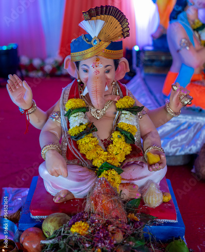 A Closeup shot Ganpati Installed in a Pandal during the 10 Day Ganesh Festival, the idols are immersed in heavy water bodies after the 10 days. photo