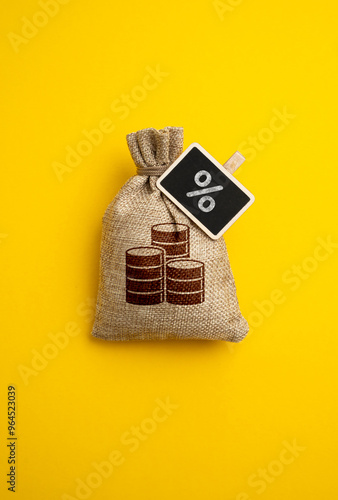 Money bag and percentage. Loan at interest. Conditions for deposits and loans. Markups and price increases. Inflation. Taxes and tariffs. photo