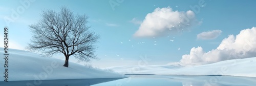 A serene winter scene featuring a solitary tree standing tall against a backdrop of snow-covered hills and a tranquil lake. The blue sky, fluffy clouds, and gentle snowfall create a peaceful and calmi photo