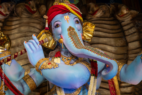 A Closeup shot Ganpati Installed in a Pandal during the 10 Day Ganesh Festival, the idols are immersed in heavy water bodies after the 10 days. photo