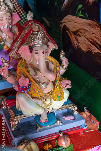 A Closeup shot Ganpati Installed in a Pandal during the 10 Day Ganesh Festival, the idols are immersed in heavy water bodies after the 10 days. photo