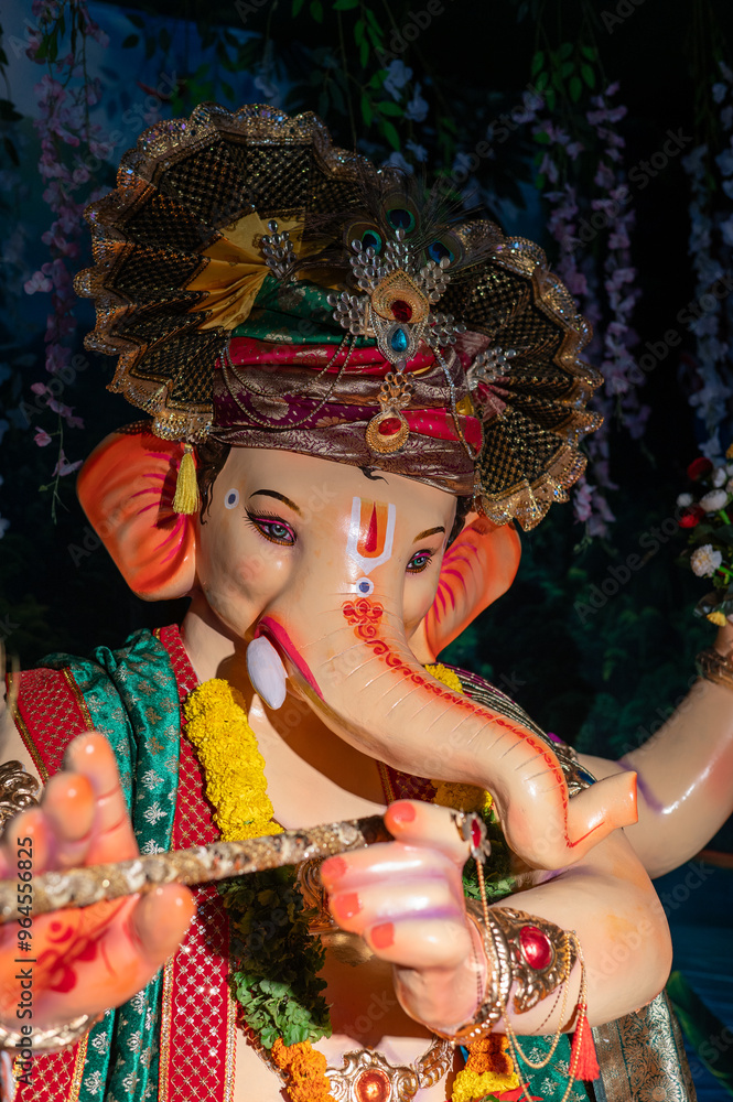 A Closeup shot Ganpati Installed in a Pandal during the 10 Day Ganesh Festival, the idols are immersed in heavy water bodies after the 10 days. A Closeup shot Ganpati Installed in a Pandal during the 10 Day Ganesh Festival, the idols are immersed in heavy water bodies after the 10 days.