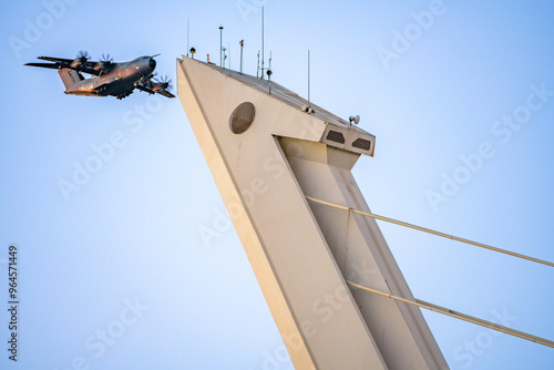 Airbus A400M Atlas Flying Near Alamillo Bridge in Sevilla photo