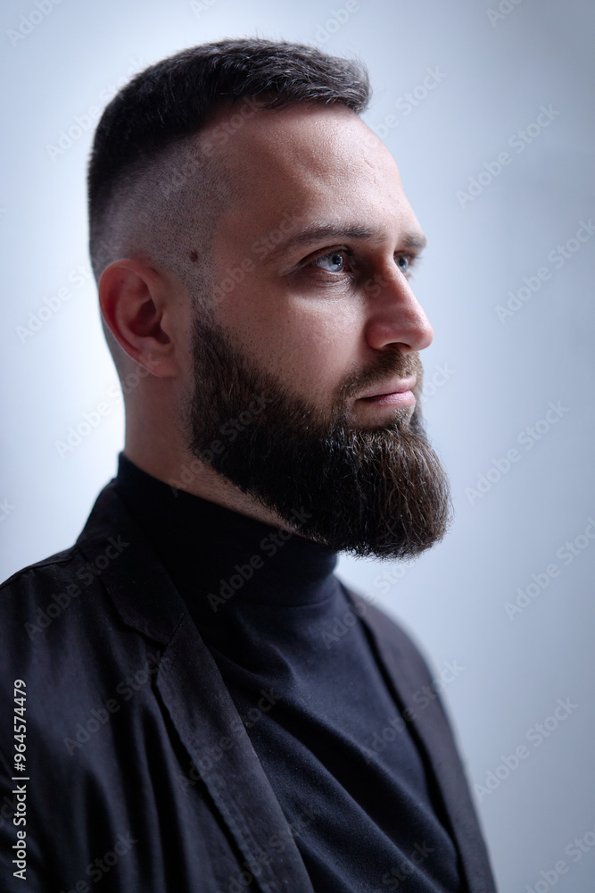Fototapeta premium Studio portrait of young handsome man with beard.