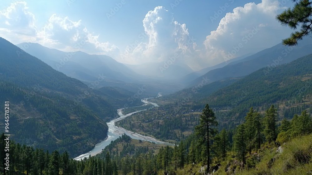 Fototapeta premium The breathtaking view of the Paro Valley from Tiger's Nest Monastery, with the river winding through the valley below.