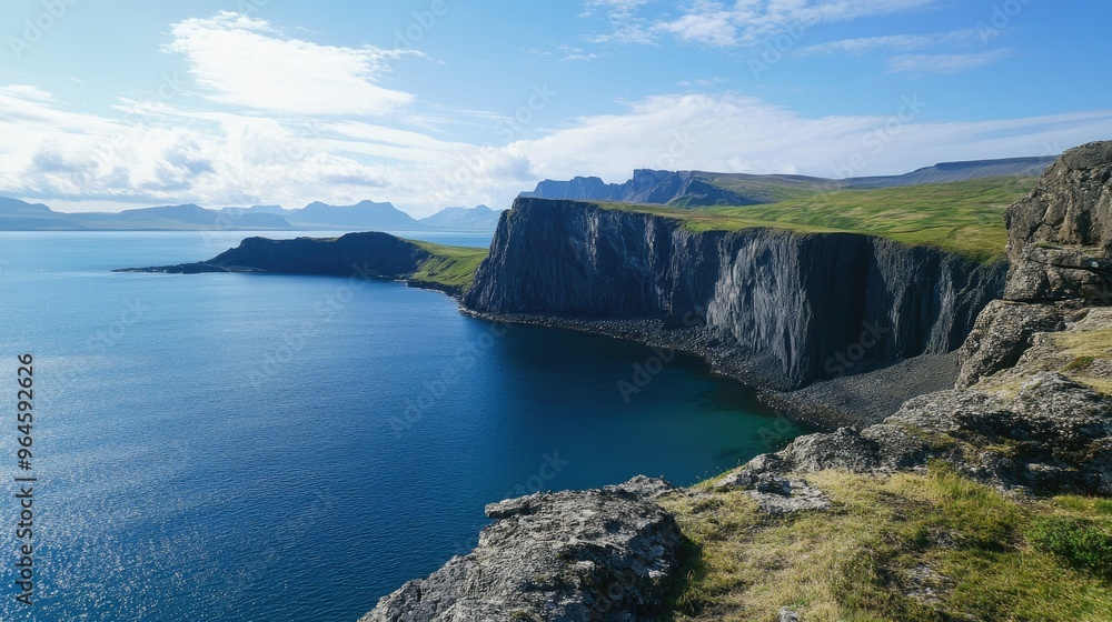 Fototapeta premium The iconic view of the Sgsvatn lake, perched above the ocean on the island of