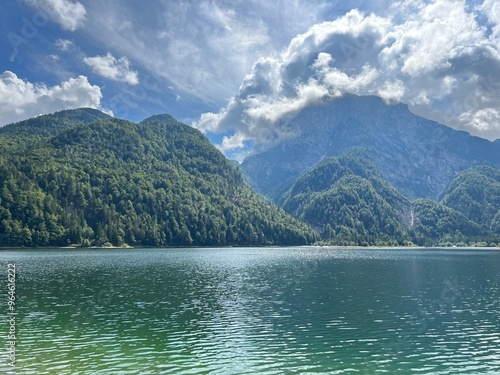 Schilderij op canvas Early autumn over the alpine lake Lago del Predil or Lago di Raibl (Cave del Pre