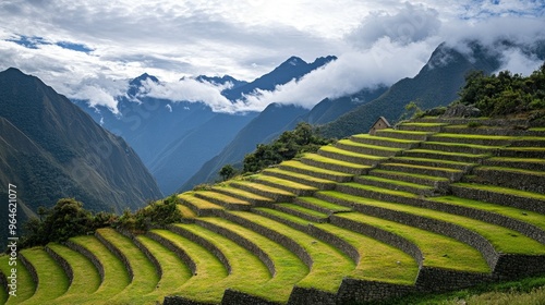 The terraces of Machu Picchu with the Andes mountains in the background photo