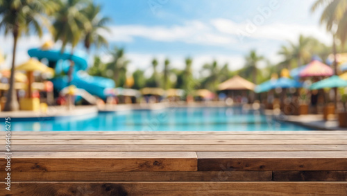 The empty wooden table top with blur background of water park. For product display