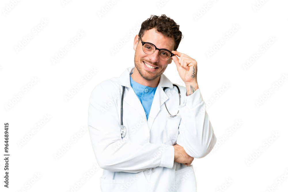 Brazilian doctor man over isolated chroma key background with glasses and happy Brazilian doctor man over isolated chroma key background with glasses and happy