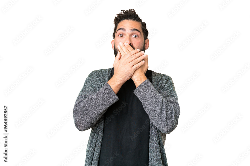 Young man with beard over isolated chroma key background covering mouth with hands Young man with beard over isolated chroma key background covering mouth with hands