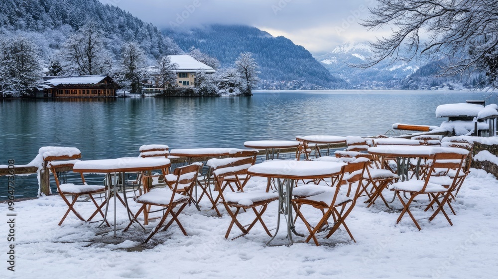 Cafe tables and chairs covered with snow, located in the German Alps near Lake Schliersee
Cafe tables and chairs covered with snow, located in the German Alps near Lake Schliersee