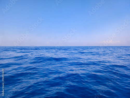 A blue ocean with a clear sky