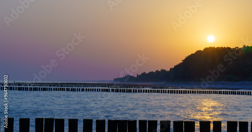 Fototapeta Naklejka Na Ścianę i Meble -  Golden sunrise over the Baltic Sea in Kolobrzeg