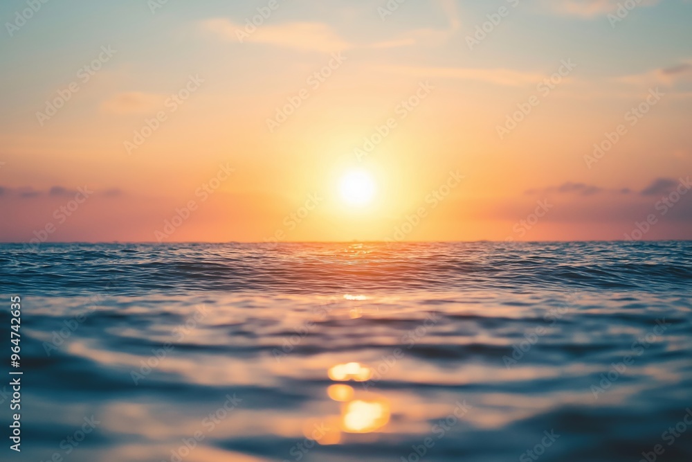 A beautiful sunset over a calm ocean, with clear skies and gentle waves capturing the serene beauty of the landscape. A beautiful sunset over a calm ocean, with clear skies and gentle waves capturing the serene beauty of the landscape.