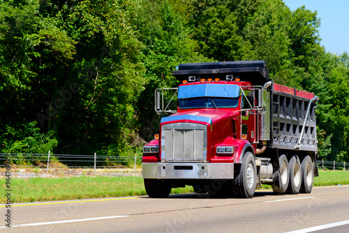 Heavy-Duty Red Dump Truck On The Highway