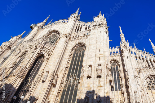 Magnificent Milan Cathedral. Gothic architecture and towering spires against a clear sky. Duomo di Milano in Italy, Dedicated to Santa Maria Nascente