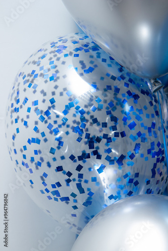 transparent balloon with confetti for a holiday