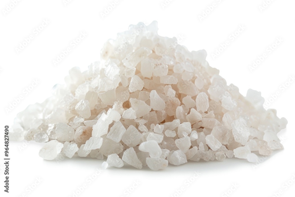 A close-up view of a pile of salt on a white background A close-up view of a pile of salt on a white background