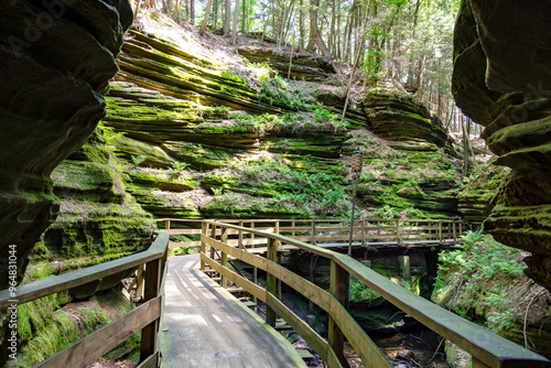 A boardwalk through a gorge of  Cambrian sandstone  along the Wisconsin River in the Wisconsin Dells.