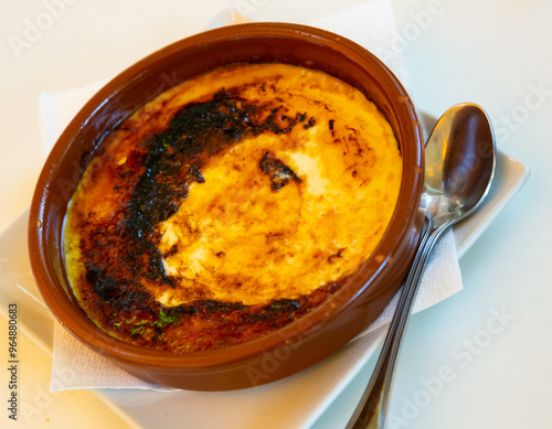 Catalan cuisine, tasty Crema catalana with caramel photo