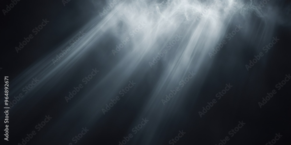 Abstract background with light rays shining through white smoke, creating a dramatic and ethereal effect. Abstract background with light rays shining through white smoke, creating a dramatic and ethereal effect.