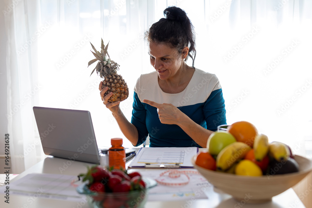 Female nutritionist holding an online consultation with a patient. Female nutritionist holding an online consultation with a patient.